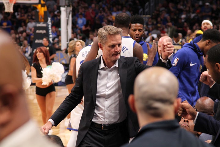 Steve Kerr rallies his team prior to tip-off.