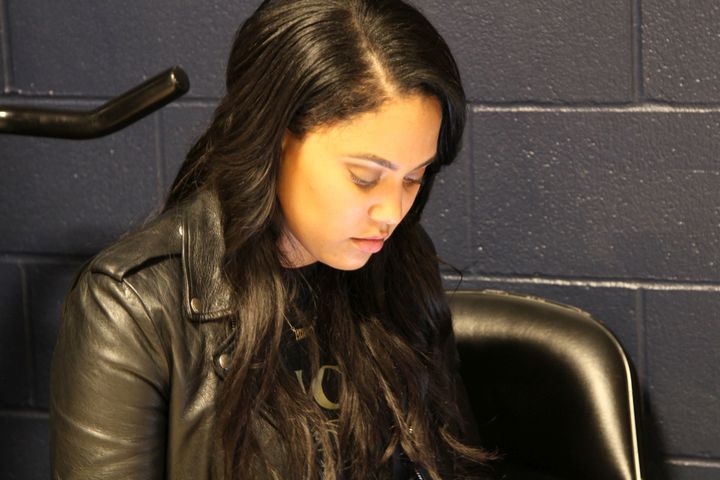 Ayesha Curry waits for her husband Stephen Curry outside the team locker room following the Warriors’ 127-108 victory.