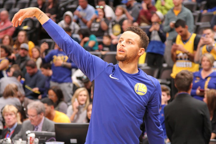 Golden State Warriors point guard Stephen Curry with the perfect form during pregame warmups.