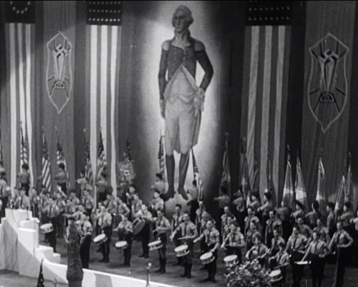 Thousands of pro-German fascists gathered at a 1939 rally in New York City’s Madison Square Garden. Nazi symbols and American flags were displayed in front of a giant image of George Washington. 