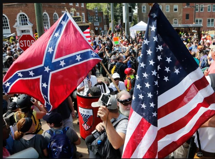 <p>Alt-Right marches in Charlottesville carried Confederate and U.S. flags and Nazi paraphernalia. </p>