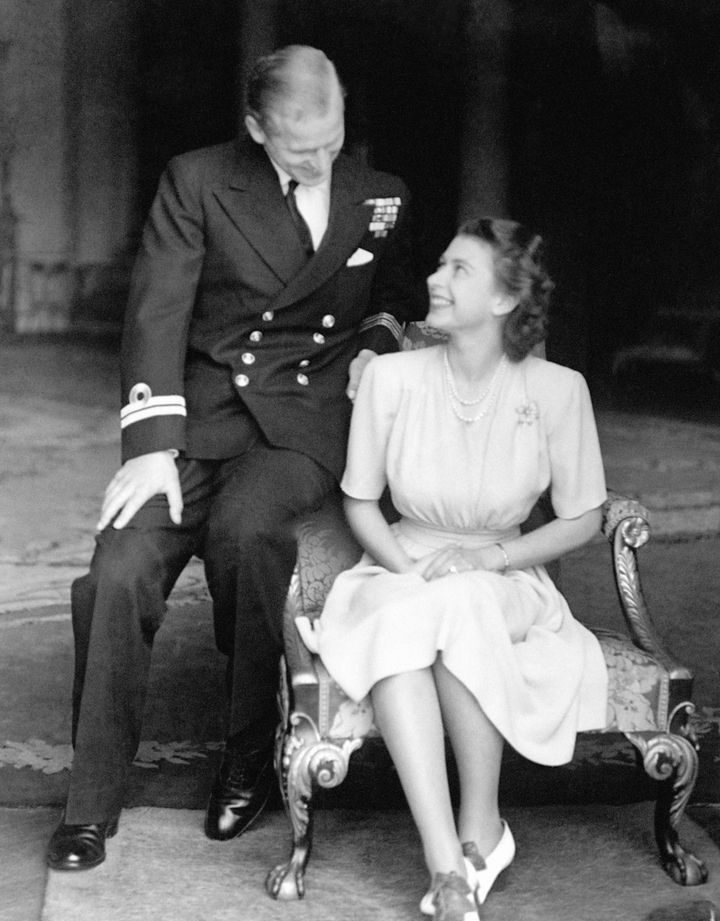 July 1947: Princess Elizabeth, the 21-year-old future queen, at Buckingham Palace with Lieutenant Philip Mountbatten, just after they announced their engagement