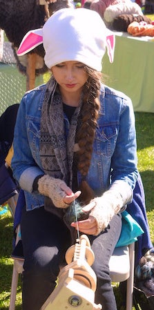 <p>At the Folklife Fair in Hailey, Idaho, a local teen spins wool like her great-grandmother once did.</p>