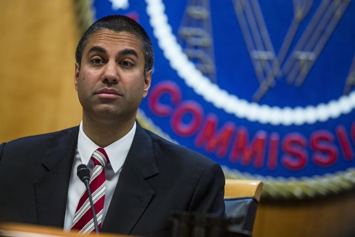 Ajit Pai, chairman of the Federal Communications Commission (FCC), pauses while speaking during an open meeting in Washington, D.C., U.S., on Thursday, Nov. 16, 2017. (Photographer: Zach Gibson/Bloomberg via Getty Images)
