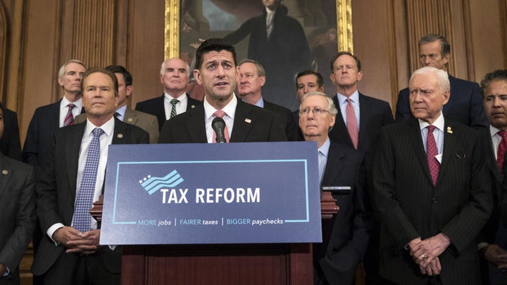 <p>House Speaker Paul Ryan, surrounded by House and Senate Republican leaders, announcing the GOP tax bill.</p>