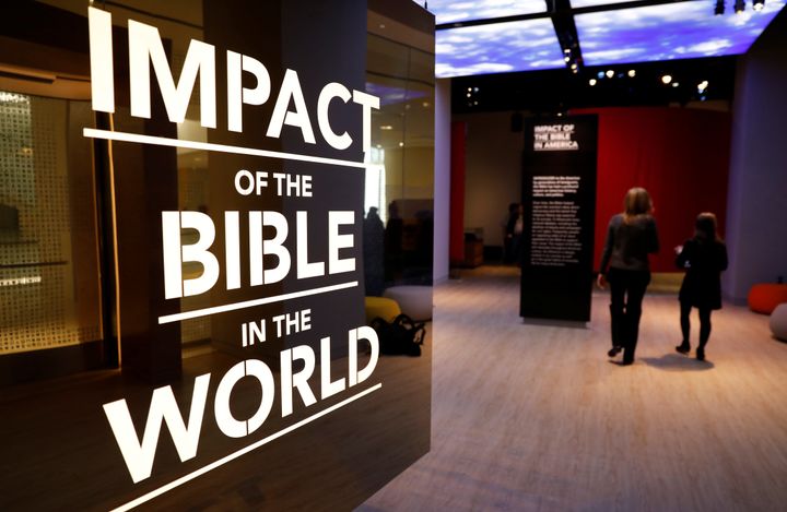 Visitors enter an exhibition at the Museum of the Bible during a preview day.