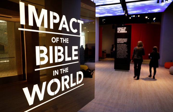 Visitors enter an exhibition at the Museum of the Bible during a preview day.