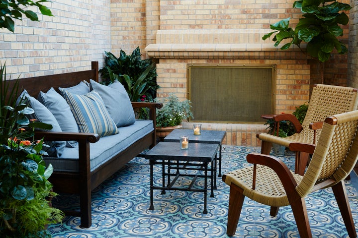 <p>Private fireplace and patio in the Emma Suite.</p>