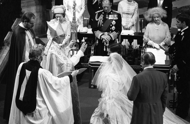 Prince Charles and Princess Diana kneel before the Archbishop of Canterbury Robert Runcie during their 1981 wedding