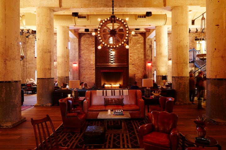 <p>Repurposed chandelier featuring brewery bottles from Pearl Brewery in Sternewirth.</p>