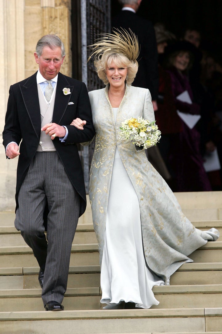 Prince Charles and The Duchess of Cornwall after a service of prayer and dedication following their wedding in April 2005, which starkly contrasted with his grand St Paul's Cathedral wedding to Princess Diana