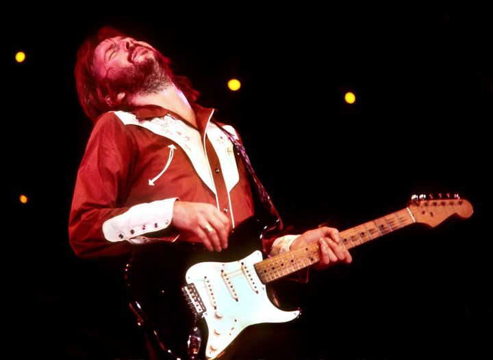 Eric Clapton playing his guitar in his bio/doc.