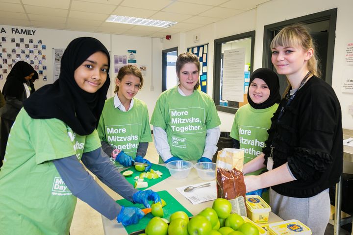 Jewish and Muslim schoolchildren cooking together to help the homeless at Sufra NW London