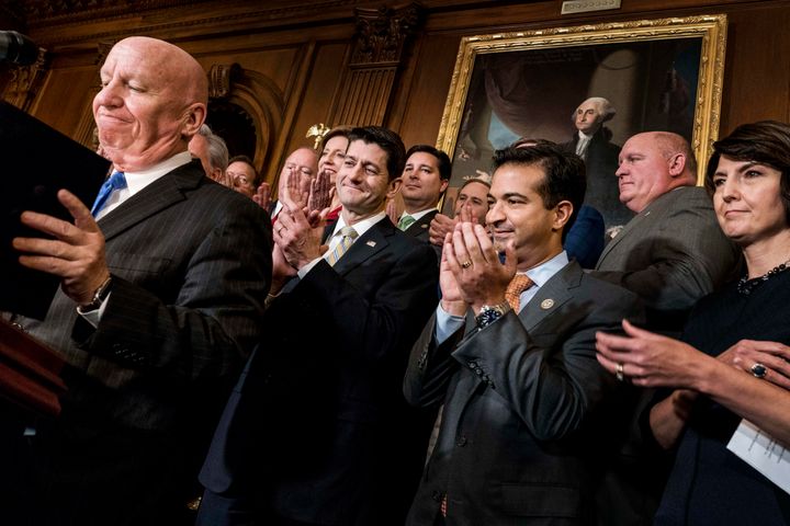 Speaker of the House Paul Ryan, along with his leadership, celebrate passing the House tax bill. 