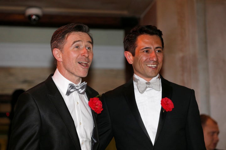 Peter McGraith and David Cabreza after their wedding at Islington Town Hall, one of the first same sex couples to wed in England and Wales