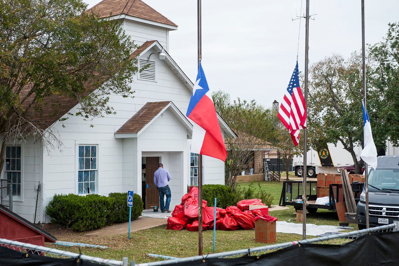 Plastic bags are piled up outside First Baptist Church in Sutherland Springs, Texas, as hazardous materials are removed from the building after the massacre.