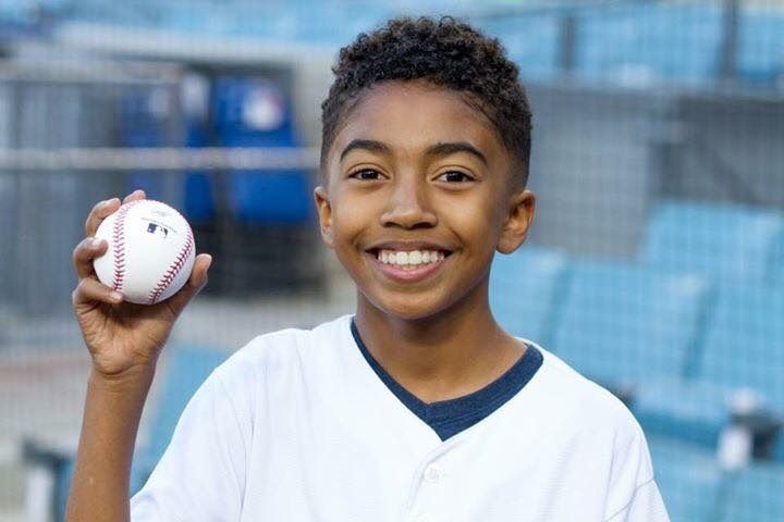 Black’ish star, Miles Brown, throws out 1st pitch for Mixed Heritage Day 