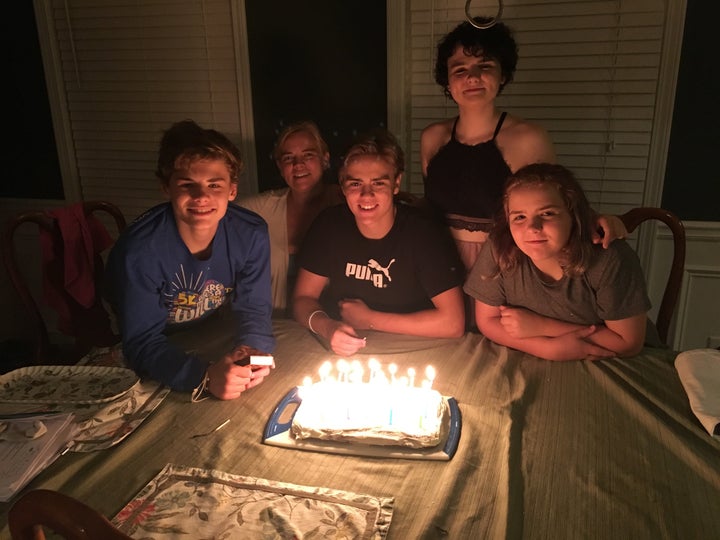 <em>From left to right:</em> Kevin, mom Carolyn, Michael, Cat and Elizabeth. Their oldest sister was away at college at the time.