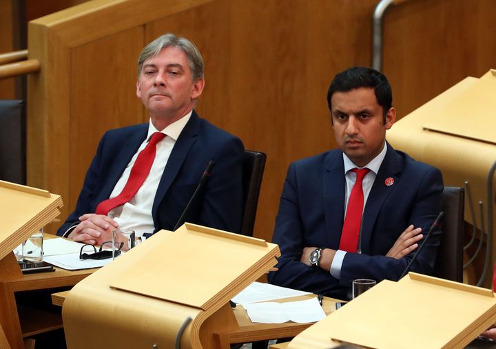 Richard Leonard, left, in the Scottish Parliament chamber alongside Anas Sarwar