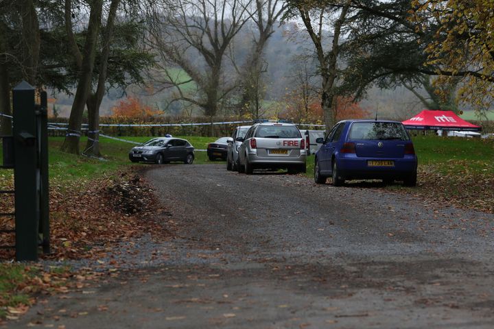 The entrance to Waddesdon Manor Road, in Buckinghamshire, as police resume the hunt for clues following a collision between a helicopter and an aircraft which killed two pilots and two passengers.