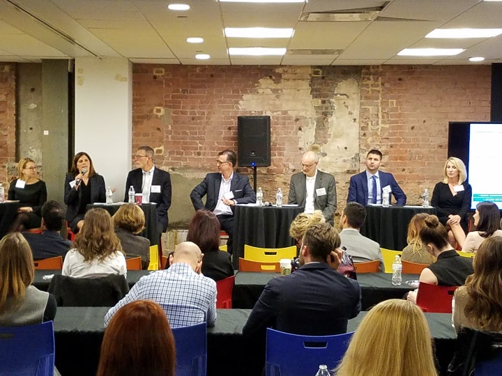 <p>Washington D.C. Panelists speak to a group of 100+.</p>