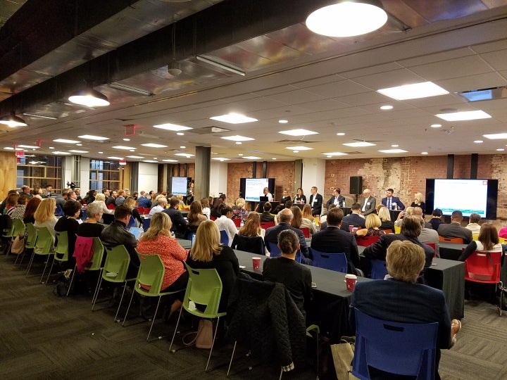 Washington D.C. Forum audience listen intently.