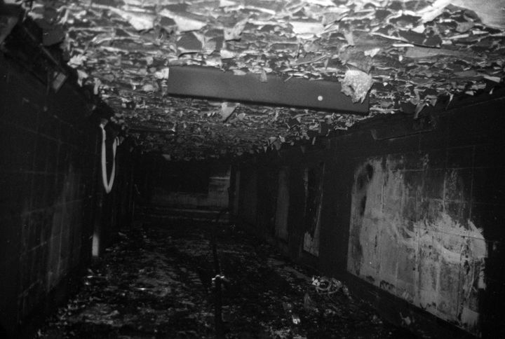 Melted roof tiles litter a subway tunnel after the blaze