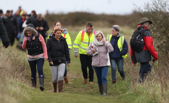 Members of the public looking for missing teenager Gaia Pope during a community search at Durlston Country Park in Dorset.
