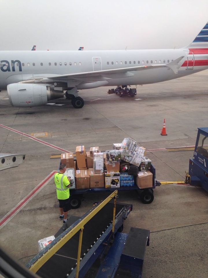 Supplies being boarded on a flight to San Juan, Puerto Rico