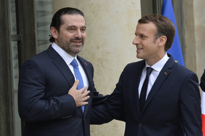 French President Emmanuel Macron welcomes former Lebanese Prime Minister Saad al-Hariri at Elysee Palace in Paris, France on