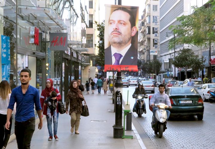 A poster showing Saad al-Hariri is seen in Beirut, Lebanon on November 15, 2017. Words on the poster read, "We are all with you."