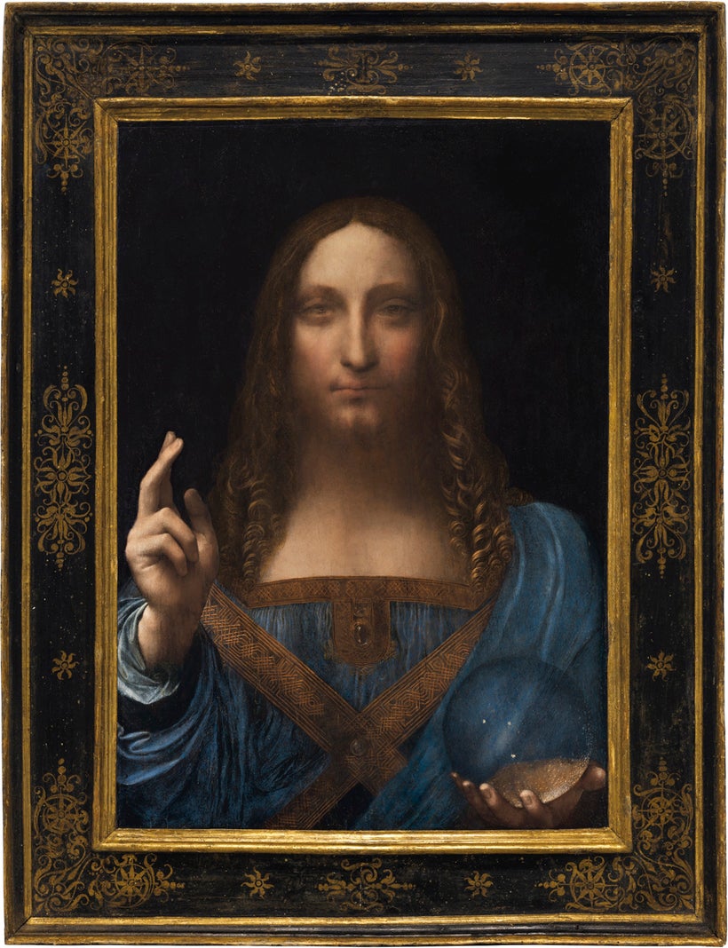 Leonardo da Vinci’s framed <em>Salvator Mundi</em>, photographed in Christie’s auction house in New York in 2017