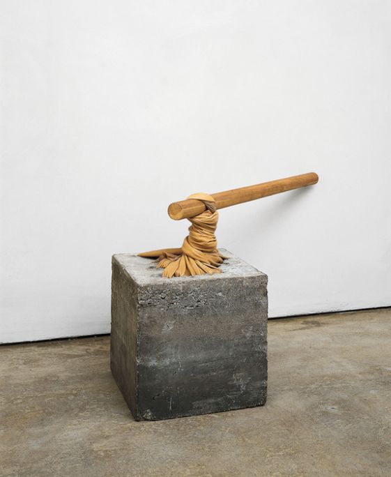 Giovanni Anselmo, Torsione (Torsion), 1968, cement, leather, wood. Overall: approx. 72 x 86 x 86 cm / 28 3/8 x 33 7/8 x 33 7/8 in cement block: 37.14 x 37.46 x 38.1 cm / 14 5/8 x 14 3/4 x 15 in wooden pole: 99.69 x 5.08 x 5.08 cm / 39 1/4 x 2 x 2 in