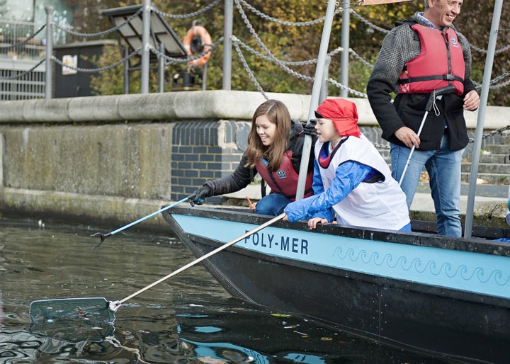 Plastic fishing on recycled boat the Poly-Mer to remove plastic litter from London's Docklands