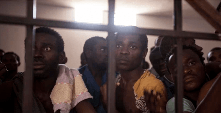 <em>Young Africans being held to be sold as slaves in Libya. </em>