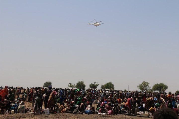 A WFP helicopter arrives with supplies of nutrition items and vegetable oil. Many South Sudanese civilians have been uprooted from their homes by war and depend on humanitarian deliveries from WFP to survive. 