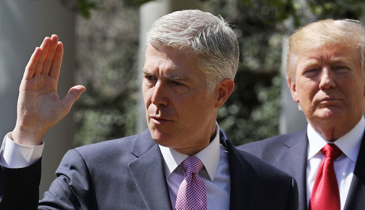 <p>U.S. Supreme Court Justice Neil Gorsuch takes the judicial oath in April 2017.</p>