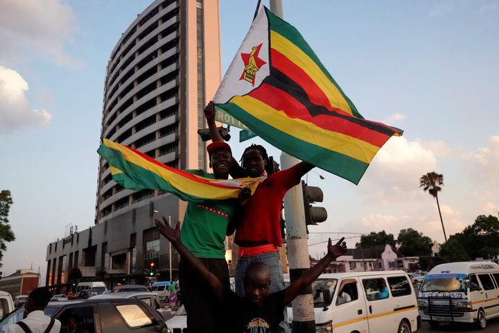 People celebrate Mugabe's resignation in Harare