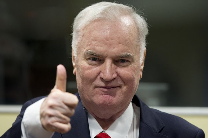 Mladic gestures at the beginning of Wednesday's sentencing