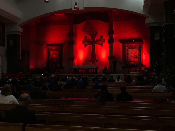 The Our Lady of Perpetual Help church in Erbil, Iraq, is lit up for a #RedWednesday vigil.