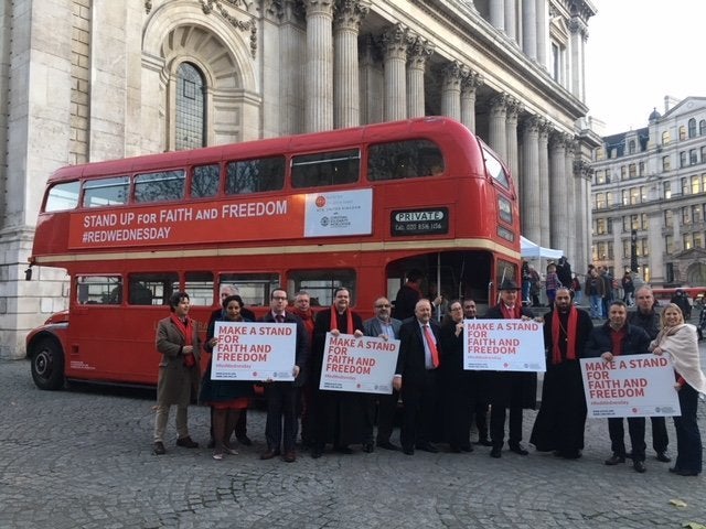 Participants attend a #RedWednesday event in central London. 