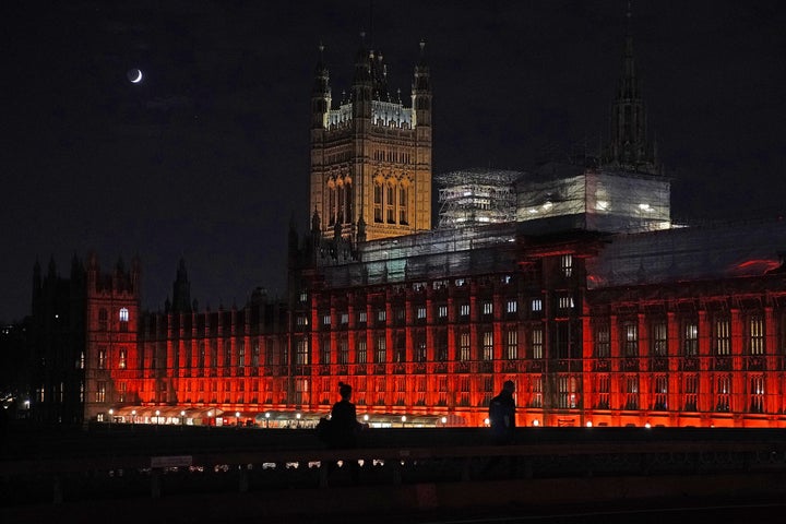 The Houses of Parliament were floodlit in red to remember all those killed, kidnapped, tortured or suffering because of their