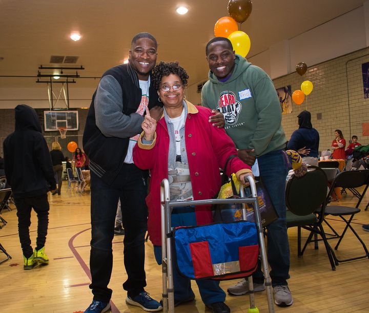 BMe Co-Founder Benjamin Evans poses with event participant and volunteer Eric Thompson at the Food From Heaven Thanksgiving event. 