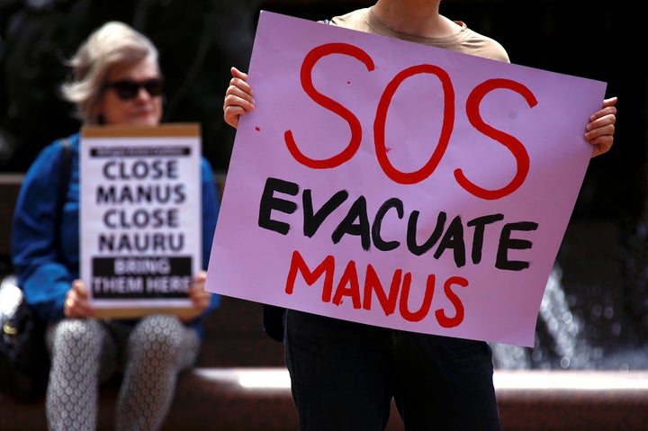Authorities were attempting to remove hundreds of asylum seekers from a detention center in Papua New Guinea on Thursday afte