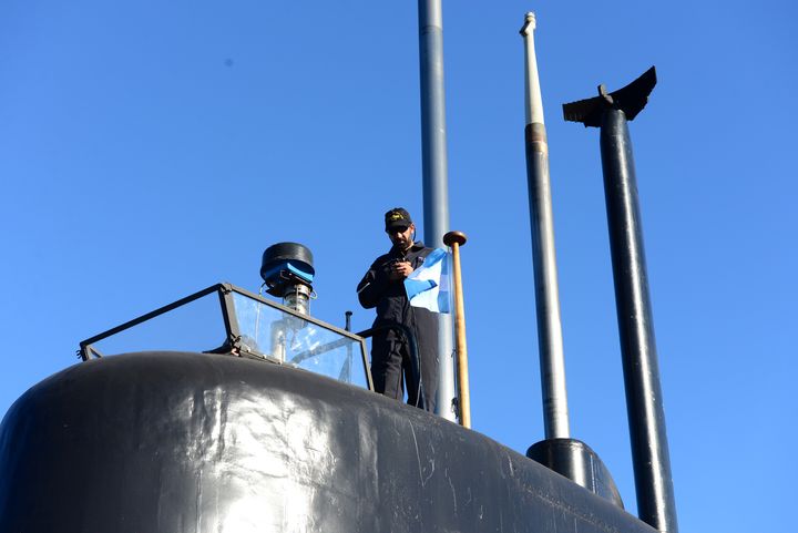 A crew member stands on the ARA San Juan at the port of Buenos Aires in 2014 