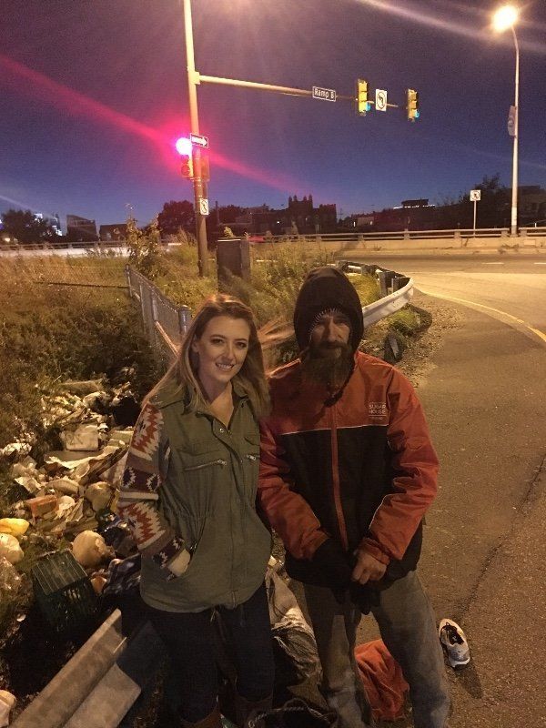 New Jersey resident Kate McClure pictured with Johnny, a homeless man who helped her when she needed it.