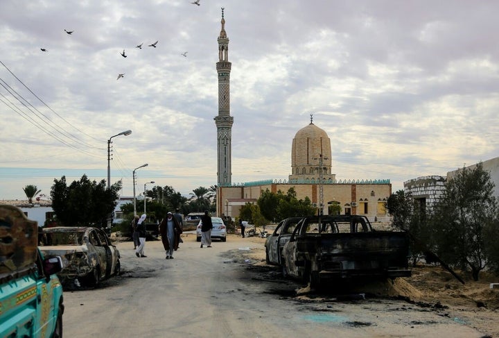 Wreckages of cars are seen after the Egypt Sinai mosque bombing in Al-Arish, Egypt on November 25, 2017. (Photo by Stringer/Anadolu Agency/Getty Images)