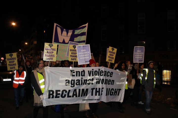<strong>The front banner read: 'End violence against women'</strong>