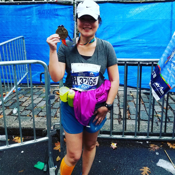 <p><em>Kristin Meekhof moments after crossing the finish line</em></p>