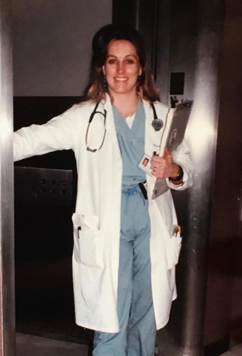 <p>A younger Dr. Kronenberger at work - a lifelong passion for Medicine.</p>